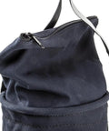 Close-up of Beefy Heavy Duty Canvas Tool Bucket with Zip Top Flame Resistant Closure, showcasing rugged material and zipper detail.