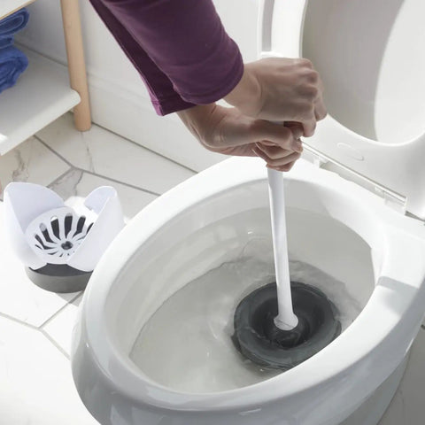 Person using Heavy Duty Toilet Plunger With Hideaway Holder Caddy, The Go-To Bathroom Tool, Compact Design With Non-Skid Rubber Base