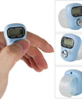 Pocket Electronic Finger Counter With LCD Display Lightweight Resettable Hand Tally Clicker Zero To Ninety Nine Thousand Single Hand Grip in use on finger