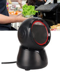 Desktop Barcode Scanner With Global Shutter And Big Window LED Indicator in a retail checkout counter setting.