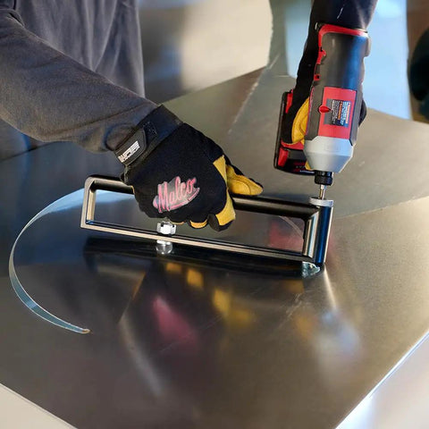 Person using Adjustable Hole Cutter 2 To 20 Inch For Sheet Metal, Cuts 20 Gauge Galvanized Steel drill on metal sheet
