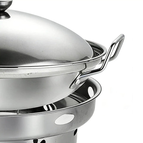 Close-up of Go-To Portable Alcohol Stove Set for Camping with adjustable lid pot and stainless steel handles.
