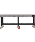 Pro Shop Heavy Duty Welding Fixture Table With Precision Laser Cut Grid Powder Coated Steel Frame Six Rolling Caster Wheels And Bottom Storage Rack For Makers side view with caster wheels