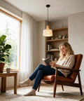 milaruoro Pendant Light with Bamboo and Fabric Shade, Black Hanging Light Fixture for Kitchen Island, Modern Farmhouse Lighting for Dining Room Bedroom Living Room Hallway illuminating a cozy reading corner.