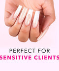 Hand with acrylic nails using 16 Fl Oz Liquid Monomer For Nail Extensions With 100 Percent Kolinsky Size 10 Brush Starter Duo