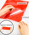 Hands peeling red HTV Heat Transfer Vinyl Bundle For T Shirts 10x12 Inch Sheets 12 Pack In 9 Assorted Colors Ideal For Cricut Silhouette Cameo And Heat Press Machines Includes Teflon Sheet For Easy Iron On showing ironing and cutting side with circle highlighting elasticity.