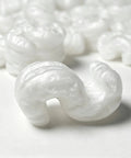 Close-up of Boss Level Anti Static Packing Peanuts, lightweight void cushion material for shipping and moving, 30 gallon bag.