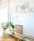 Powell Collection Transitional Three Light Vanity in Pewter Nickel Silver Finish Damp Rated for Bathrooms over mirror