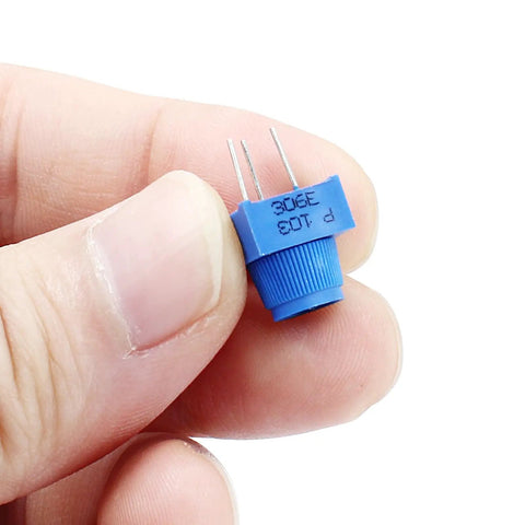 Close-up of blue trim potentiometer from 10 Pcs 10K Ohm Breadboard Trim Potentiometer Kit With Blue Knobs For Arduino Projects And Prototyping A Real Must Have For Fine Tuning And Precise Adjustments And Easy Calibration.