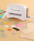 Portable Manual Die Cutting And Embossing Machine For DIY Crafting Hand Operated Paper Card Scrapbook Die Cutter For Embossing And Die Cutting At Home And On The Go with dies and colored paper sheets