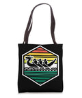 Black paddler tote bag for dragonboating fans and teams, race day ready gear carrier, colorful dragon boat design.