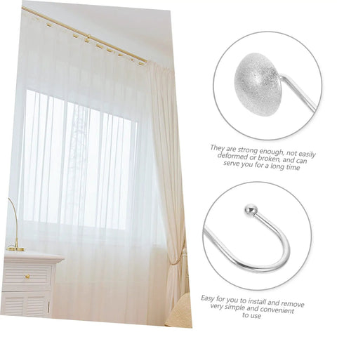 12 Piece Half Frosted Silver Snowflake Shower Curtain Hooks Set For Easy Glide Bathroom Drapery Rings And Window Curtain Hangers, Decorative Quick Install For A Sleek Tidy Look displayed with window curtain.