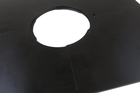 Close-up of Professional Grade Anodized Aluminum Router Table Insert Plate 9 X 12 Inch showing bit hole and alignment grooves.