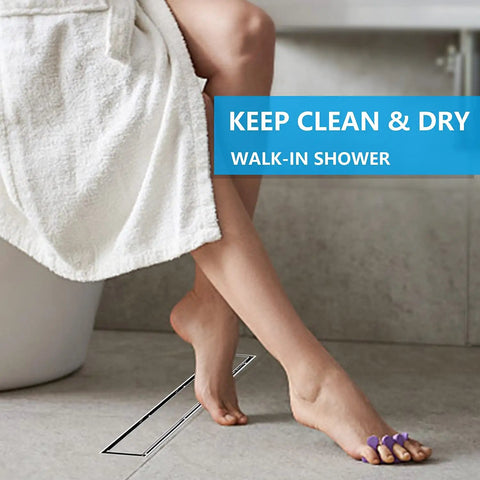 Woman's feet next to Tile Inset Linear Shower Drain 36 Inch 2 In 1 Brushed Nickel 304 Stainless Steel Floor Drain With Tile Insert Grate.