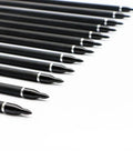 Close-up of tips of Beefy 30 Inch Carbon Arrows For Target Practice And Bow Hunting 0.309 Inch Outer Diameter With Orange And White Vanes