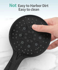 Hand touching the Oversized 2 In 1 Shower Head And Handheld Combo With 6 Spray Settings Matte Black surface