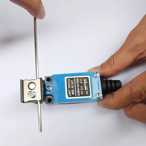 Hands holding a 2 Pack ME-8107 Adjustable Rod Lever Arm Limit Switch 1NC 1NO Momentary Travel Switch For CNC Mills, Zinc Alloy Body.