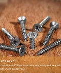 Tough As Nails Number 8 By 1 Inch 304 Stainless Steel Wood Screws 100 Piece Pack on wood surface, showing flat heads and sharp threads.
