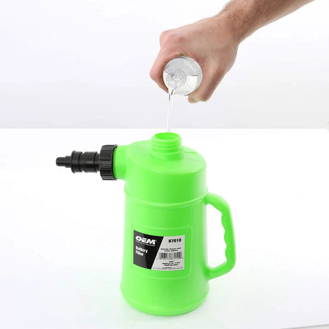 Pouring water into Battery Water Filler Jug With Auto Shutoff Nozzle 2 Liter Distilled Water Bottle For Lead Acid Batteries