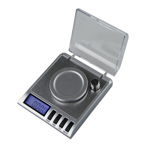 Hella Precise 20g Digital Pocket Scale For Jewelry And Small Loads With Dead On 0.001G Precision Lab Balance showing metallic surface and blue LCD display.
