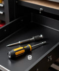 Top Tier 2 Pack Motorcycle Cam Chain Tensioner And Extender Adjuster For Suzuki Bikes tools in black drawer with yellow screwdriver.