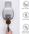 Professional 58 Mm Coffee Tamper Machine With Auto Fill And Tamp System Plus Six Height Options For Dead Flat Espresso Beds No Fuss Cleanup And Lockdown Portafilter Mount on countertop with portafilter loaded with coffee grounds.