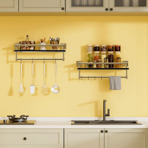 Kitchen setup with wall-mounted shelves, hanging utensils, spice jars, yellow backsplash, modern kitchen organization