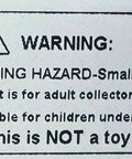 Warning label for Super Slick Miniature Dollhouse Laundry Set; choking hazard for adult collectors, not suitable for children under 14.
