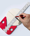 Solid As A Rock Aluminum Circle Center Finder With Forty Five Nine Zero Right Angle Square And Detachable Marking Ruler For Dead On Layouts And No Sweat Build Day Prep marking center on wood with removable ruler.