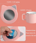 Keep Your Daily Grind Toasty With This Rapid Heating Desk Coffee Warmer featuring a pink cat design and ceramic heater. 115MM size.