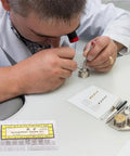 Watch Repair Kit With Stainless Steel Crown And Stem Set used by technician for quick wristwatch repairs on desk