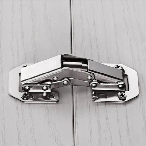 Rock Solid Stainless Steel Cabinet Door Hinge Featuring Drop Dead Smooth Hydraulic Soft Closing 90 Degree Folding Furniture Hardware That Shuts Quietly Without Making A Peep White close-up view on wood surface.