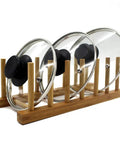 Slick Countertop Space Saver Bamboo Dish Rack And Vertical Plate Lid Organizer holds three glass lids on a bamboo rack.