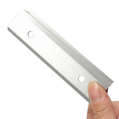 Close-up of aluminum rail from Beefed Up Solar Panel Mounting Kit With Mid And End Clamps And Rails For Roof Installations Secure Framed PV Modules On Rooftops Wind Resistant Clamp System For Easy Durable Roof Mount