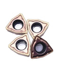 Heavy Duty Indexable Carbide Lathe Tool WCMT050308 cutting inserts in triangular shape for steel machining.