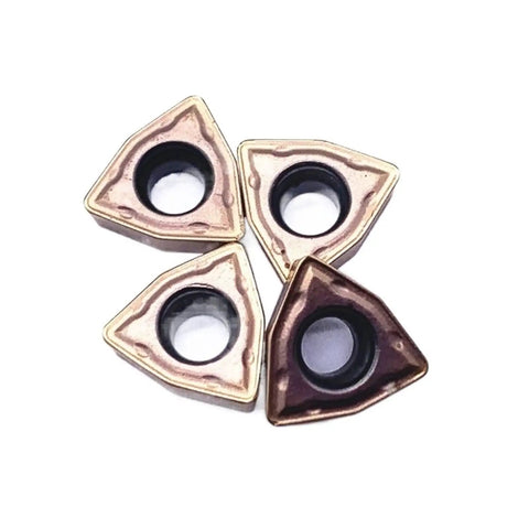 Heavy Duty Indexable Carbide Lathe Tool WCMT050308 cutting inserts in triangular shape for steel machining.