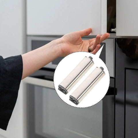 Hand using Hidden Cabinet Door Latch Four Pack Heavy Duty Push To Open Strong Touch Catch for cabinets and drawers, shown in use.