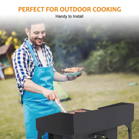 Man grilling on Two Burner Camping Stove With Up To 130,000 BTU Per Burner Heavy Duty Outdoor Gas Stove in outdoor setting