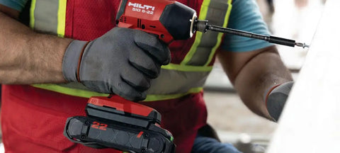 Worker using 22V Nuron SID 6 Cordless Brushless Impact Driver Tool Only With Quarter Inch Hex Quick Change for fastening