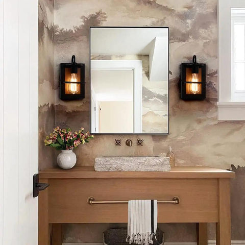 Set Of Two Farmhouse Wall Sconces With Modern Industrial Vibe, Matte Black Finish And Faux Wood Backing in bathroom