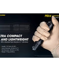 Close-up of hand holding P10iX Tactical Flashlight Floodlight 4000 Lumen Beam With USB C Rechargeable Power, emphasizing size.