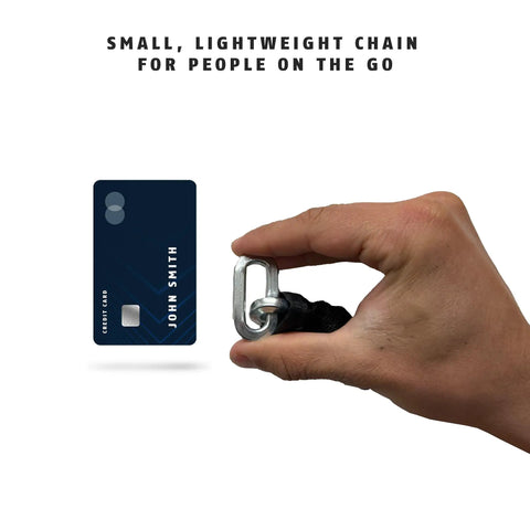 Hand holding Beefy Hardened Steel 6KS Square Security Chain, 1 Quarter Inch Thick, next to a credit card for size comparison.