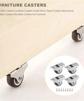 4 Piece Mini Casters 25Mm Furniture Wheels Heavy Duty Roller Replacement Hardware For Cabinets Desks And Storage Carts on wood surface.