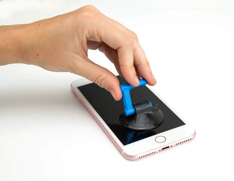 Hand using suction tool from Essential Electronics Toolkit for DIY Home and Tech Repairs with Magnetic Bit Screwdriver 16 Precision Bits