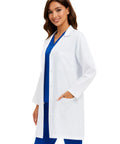 Three Pocket Women's Lab Coat With Long Sleeves White Medical Coat Relaxed Fit Size M worn by a woman with blue scrubs