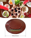 Image of 36 Inch Rotating Lazy Susan Serving Tray, solid wood turntable on dining table with dishes and drinks.