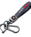 Clean Genuine Leather Car Key Ring For GMC AT4 Ride Durable Zinc Alloy Black Metal Fob Holder close-up of keychain with logo