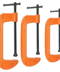 Three orange heavy duty woodworking clamps with C clip design for quick tool chuck panel fastening, 8 inch clamp fixture.