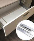 Open drawer showing floor mounting drawer slides for cabinets and cupboards, underfloor guides and rails, smooth glide hardware, 500mm length