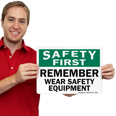 Person holding OSHA Safety Sign Label Wear Safety Equipment Reminder 10 X 14 Inch 3 Mil Laminated Polyester Durable Sticker